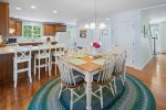 Eat on the peninsula or dining table in the open concept space